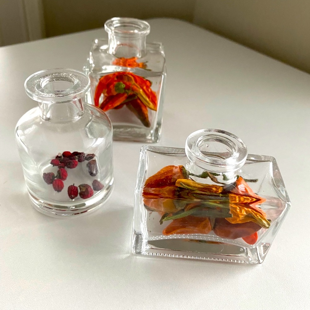 3 mini vases with dried peppers